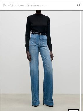 Victoria Beckham Mid-Rise Wide-Leg Jeans in Worn Blue Wash